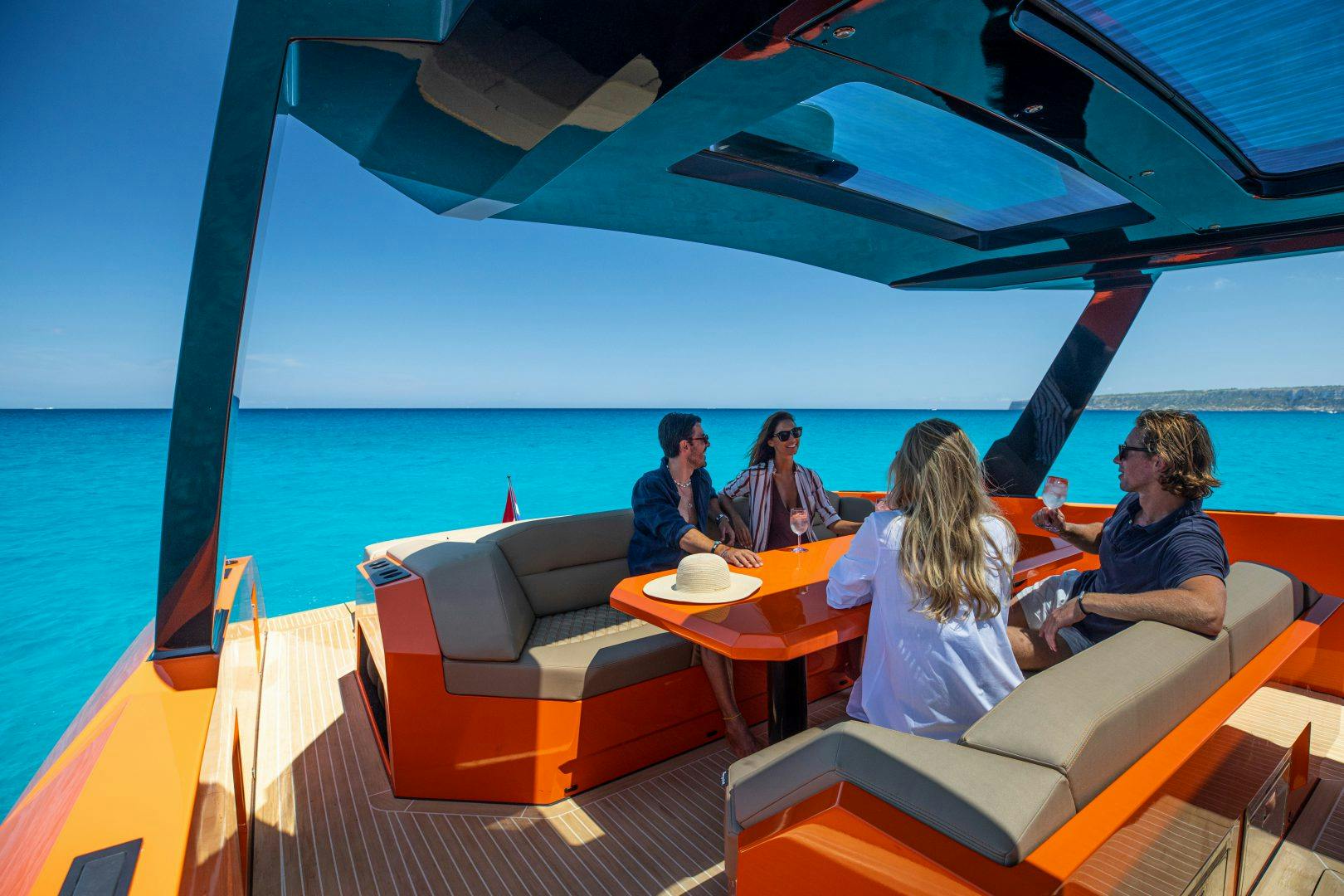 vanquish VQ52 coco loco deck view with people talking around the table